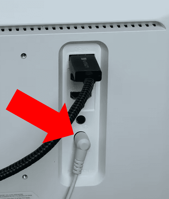 Power cable port on the back of an LG monitor.