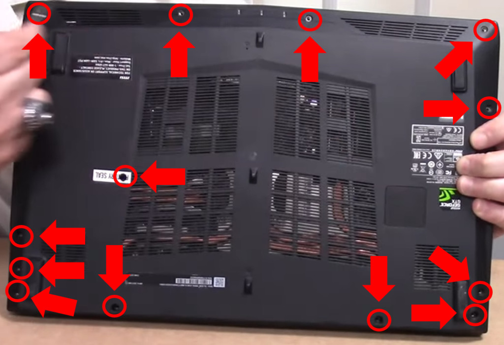 Screw locations on the back side of an MSI laptop case.