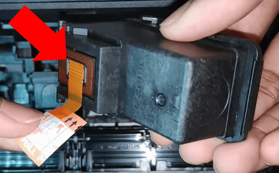 Remove pull-tabs from Canon ink cartridge 