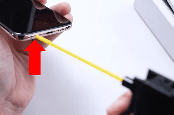 Cleaning iPhone microphone with compressed air